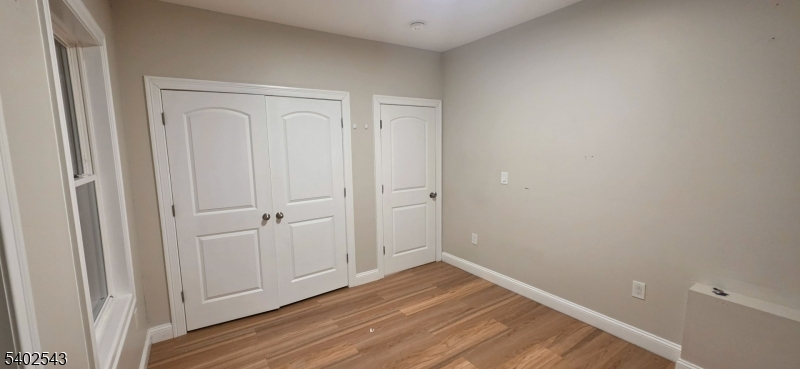 115 Wallington Avenue Wallington, NJ 07057 - Photo 8 of 13 a view of an empty room
