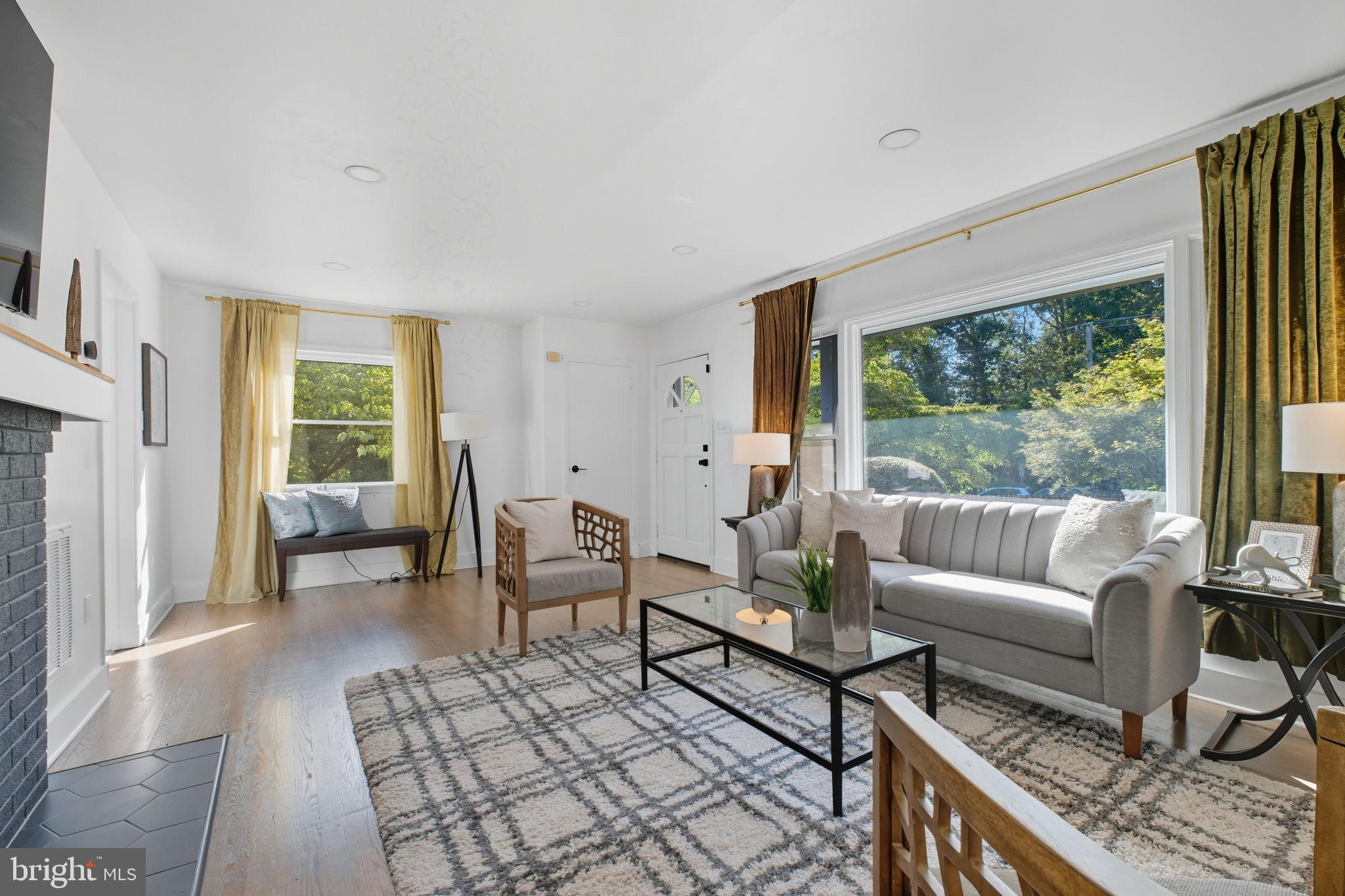2539 Gallows Road Dunn Loring, VA 22027 - Photo 15 of 43 a living room with furniture and a large window