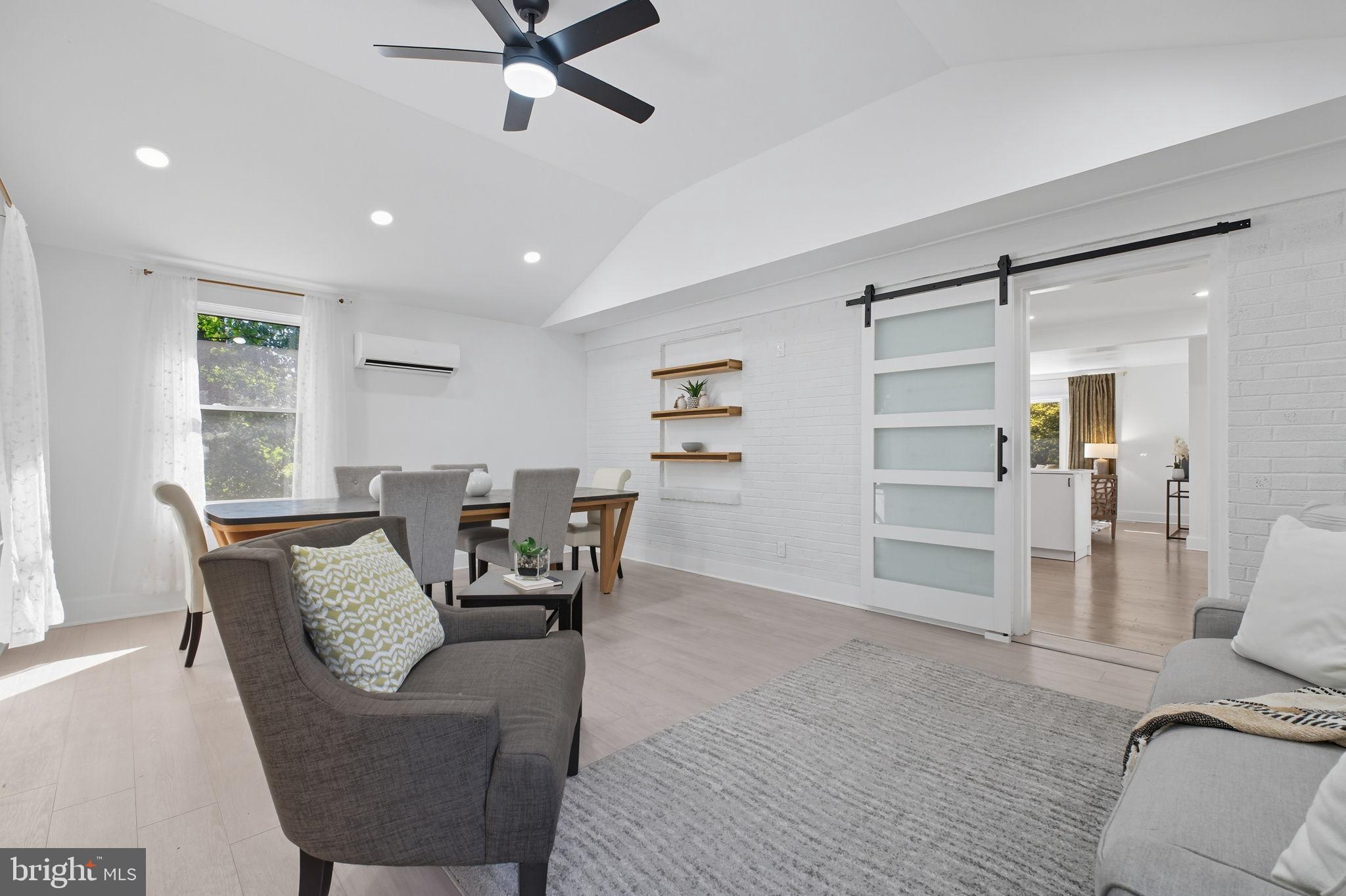 2539 Gallows Road Dunn Loring, VA 22027 - Photo 22 of 43 a view of a livingroom with furniture and a window