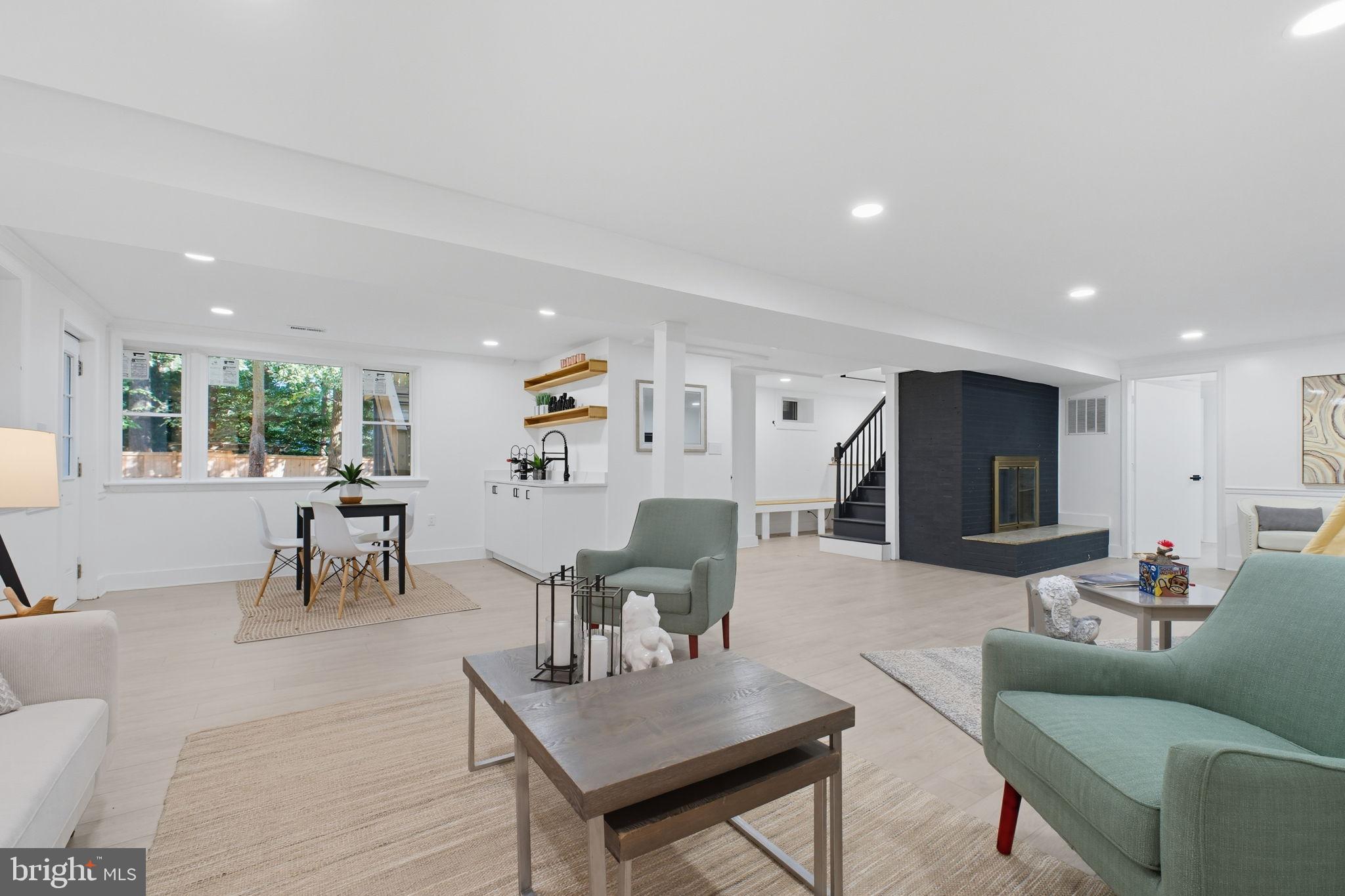2539 Gallows Road Dunn Loring, VA 22027 - Photo 34 of 43 a living room with furniture and a table
