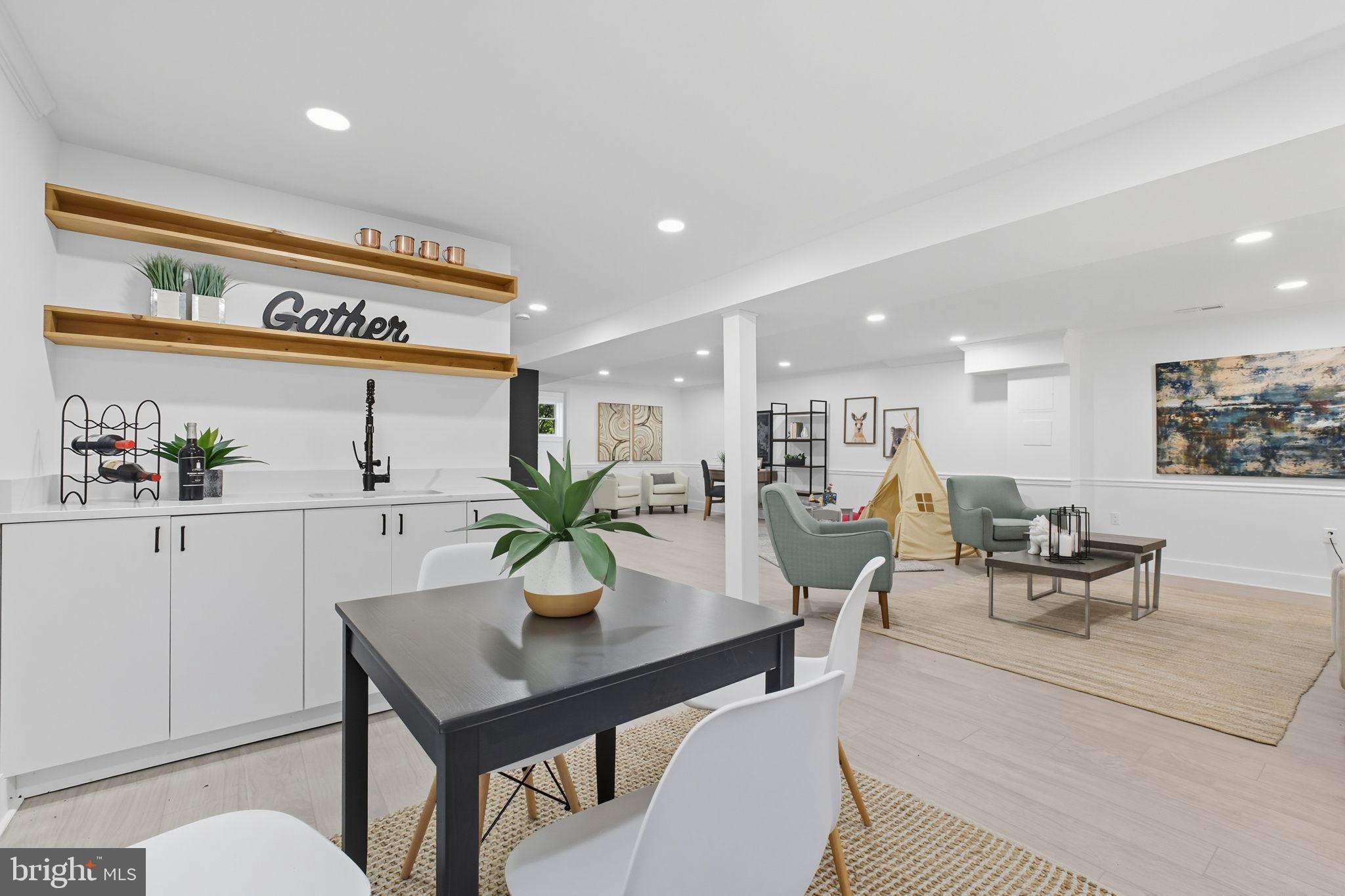 2539 Gallows Road Dunn Loring, VA 22027 - Photo 36 of 43 a living room with furniture potted plant and windows