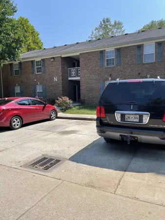 a car parked in front of a house