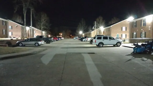 a view of a city street with cars