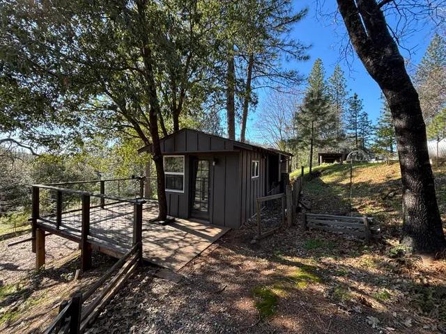 a view of a two chairs in the balcony
