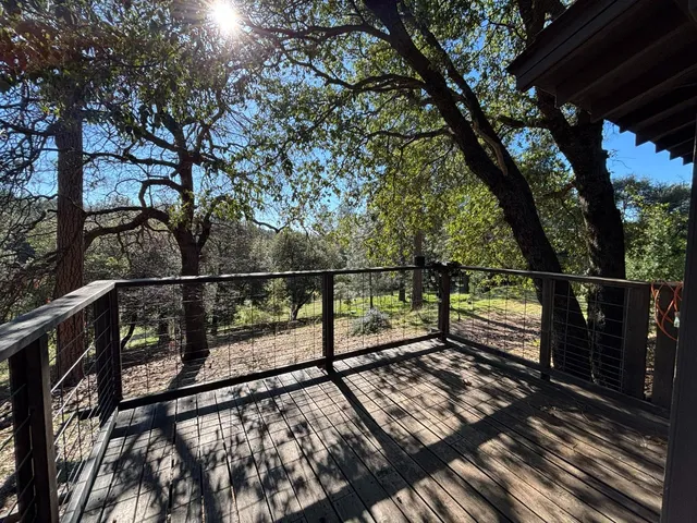 a view of a backyard of the house