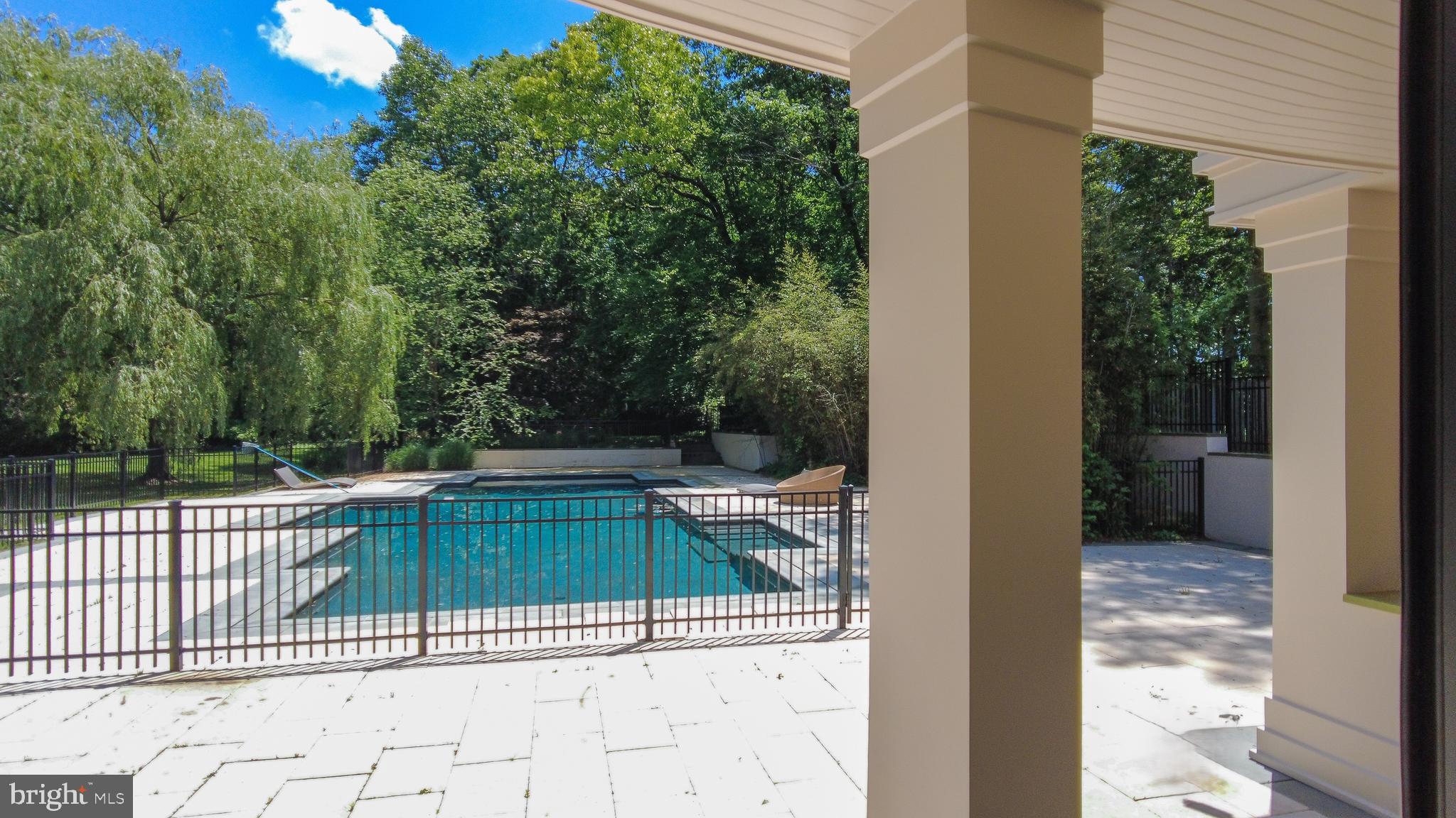 10111 Iron Gate Road Potomac, MD 20854 - Photo 18 of 94 Spectacular Patios & Geometric Infinity Pool