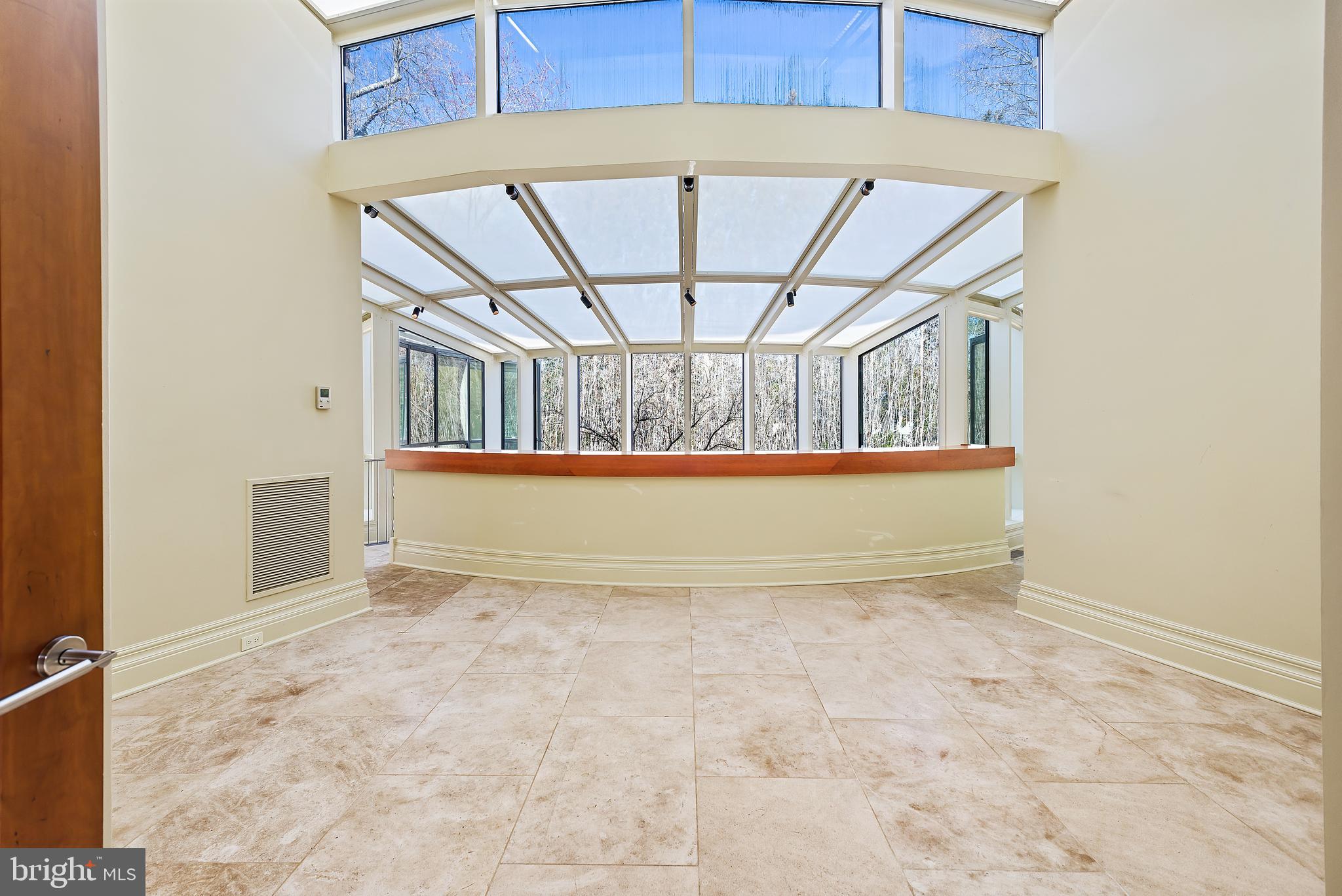 10111 Iron Gate Road Potomac, MD 20854 - Photo 35 of 94 Main Level Corridor leading to bedroom wings