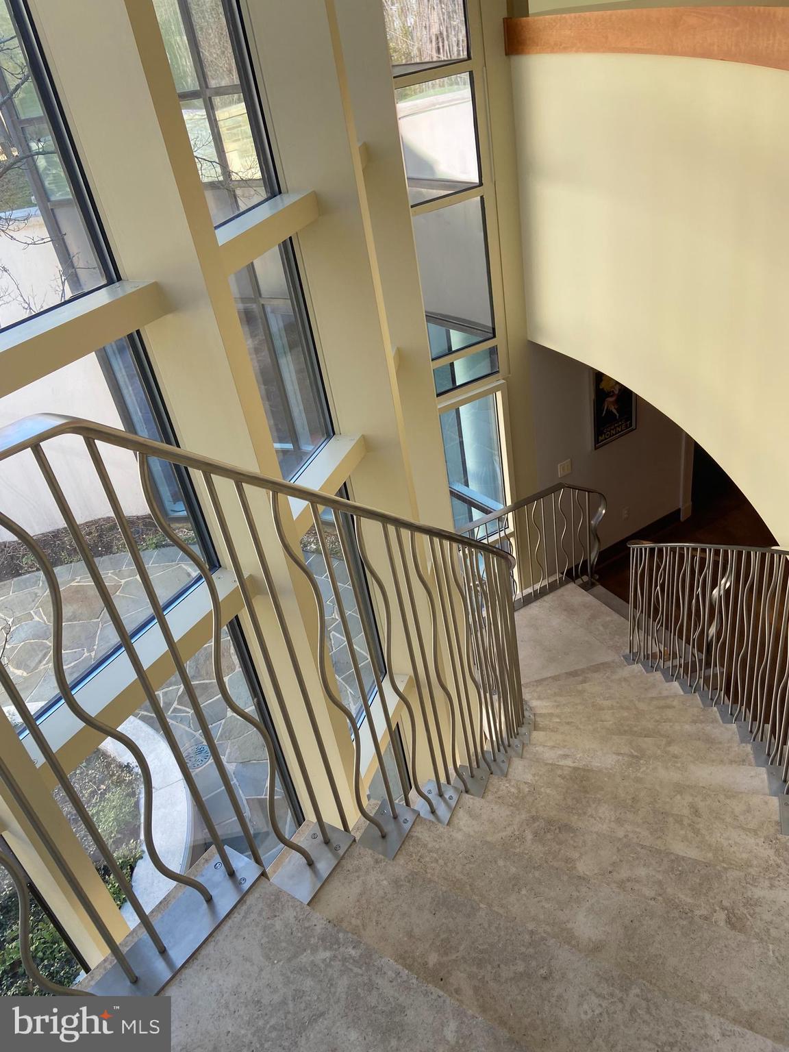 10111 Iron Gate Road Potomac, MD 20854 - Photo 60 of 94 a view of staircase with railing and stairs