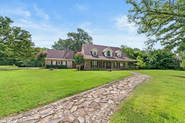 a view of a house with garden