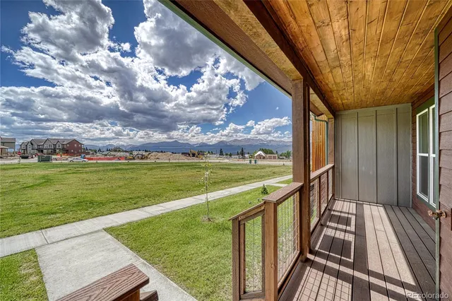 a view of swimming pool from a balcony