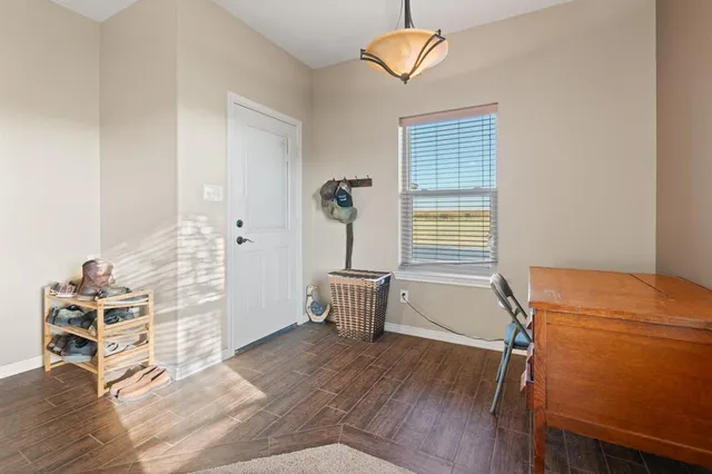 a room with furniture and a window