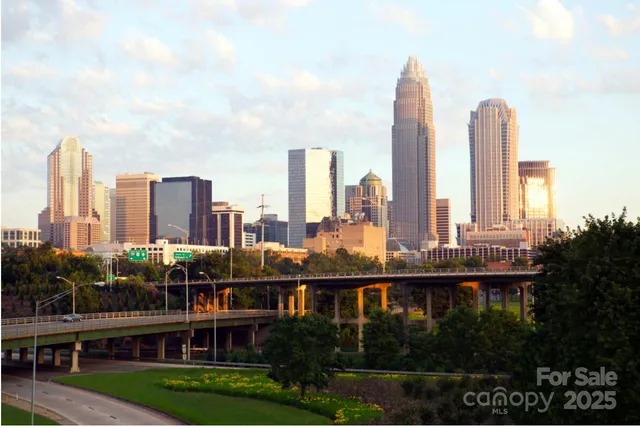 a view of a city with tall buildings