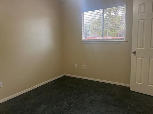 an empty room with a window