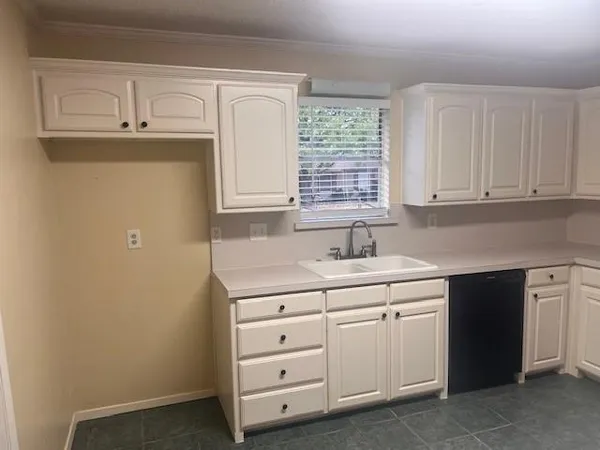 a utility room with a sink