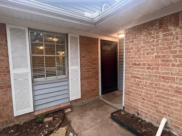 a view of house with black door