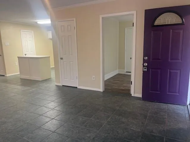 a stove top oven sitting inside of a kitchen