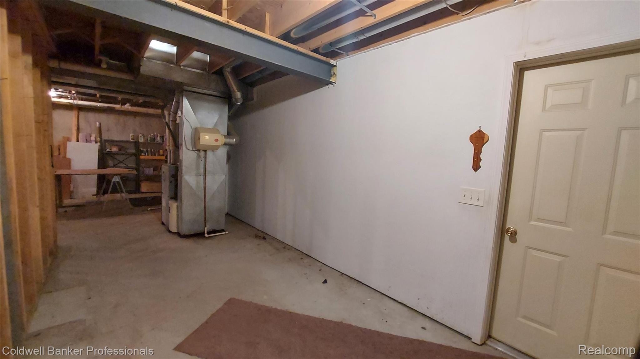 997 South Garner Road Milford, MI 48380 - Photo 41 of 43 Basement entry off garage level