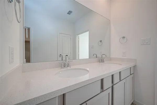 a bathroom with a bath tub
