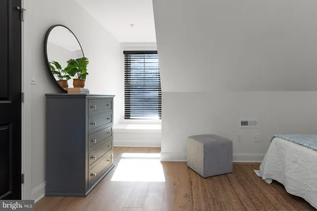 a living room with furniture and window