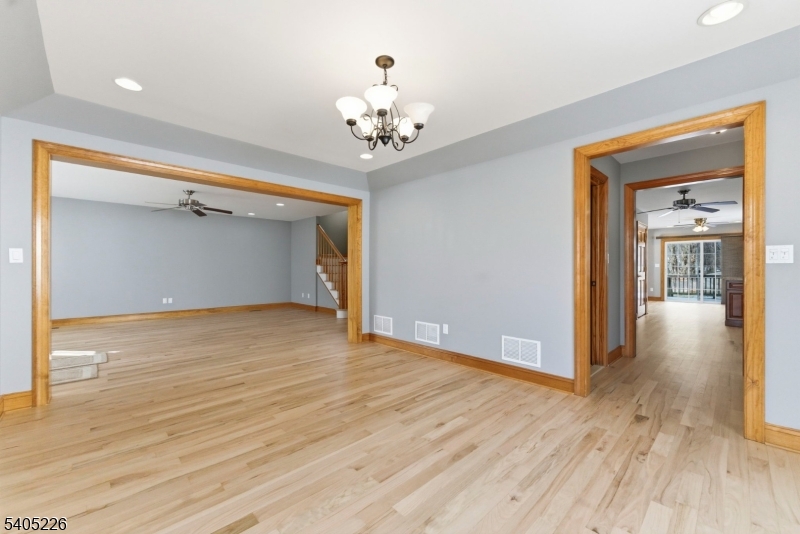 8 Kenvil Avenue Succasunna, NJ 07876 - Photo 17 of 21 a view of an empty room with wooden floor and a window