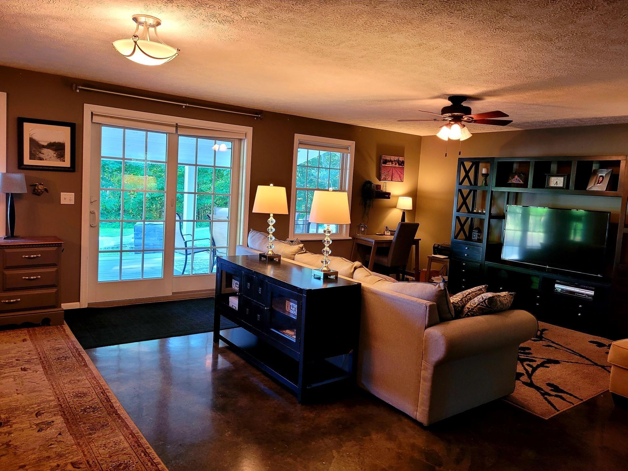 155 Kidder Road South China, ME 04358 - Photo 35 of 68 Family room view to deck