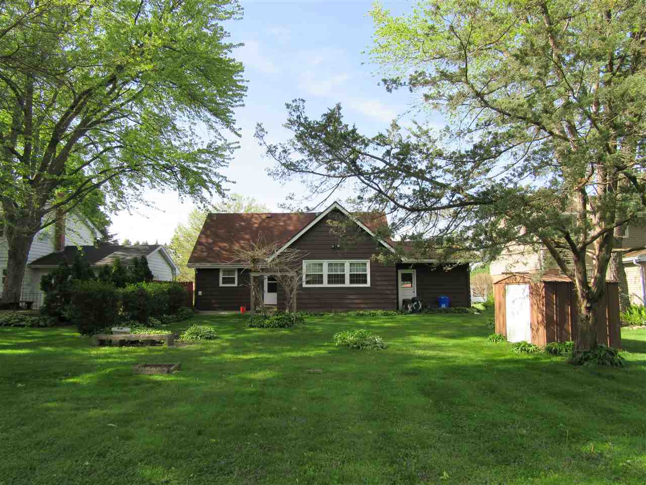 4045 Abbotsford Road Rockford, IL 61107 - Photo 15 of 18 a front view of house with yard and green space