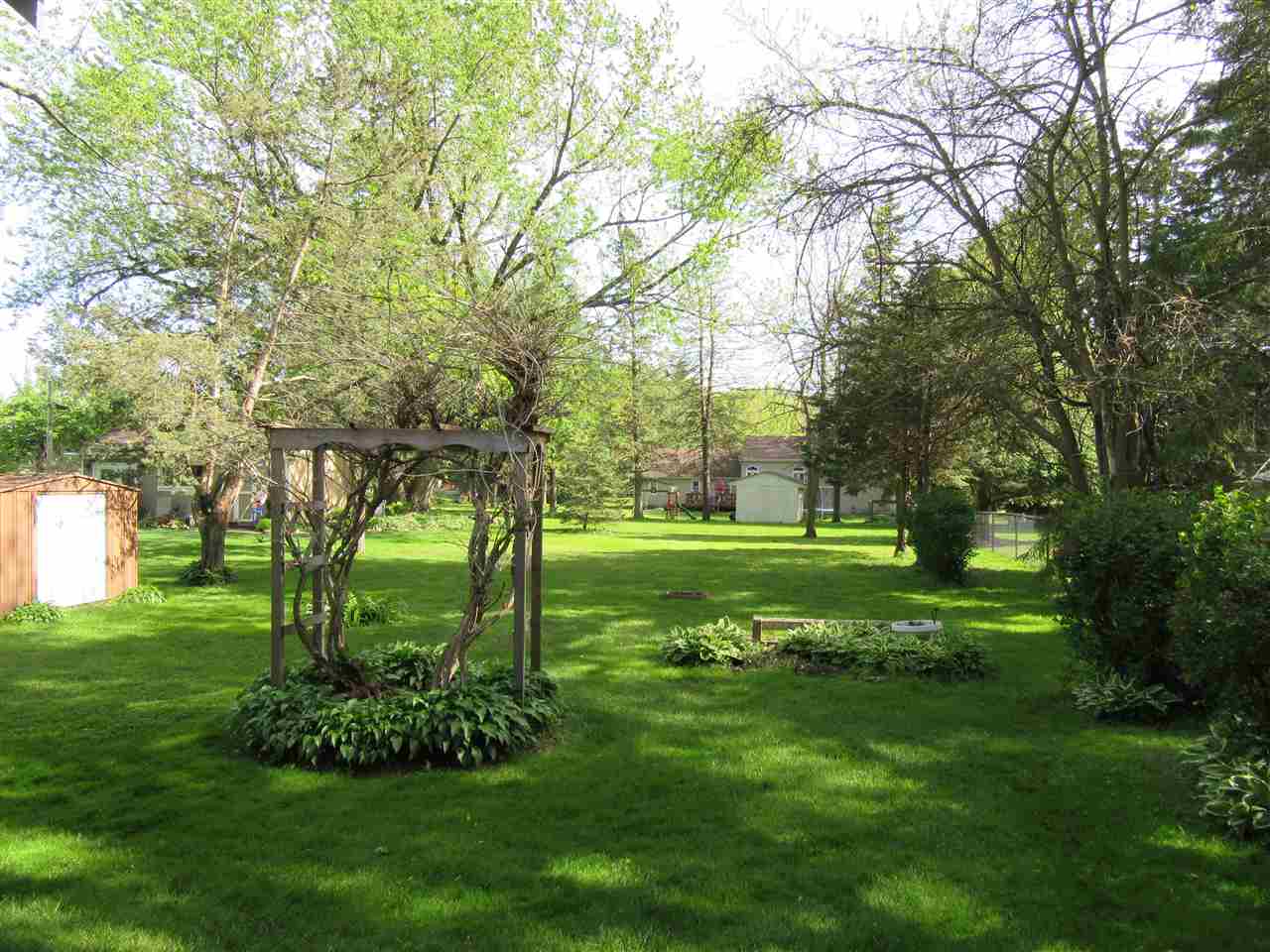 4045 Abbotsford Road Rockford, IL 61107 - Photo 17 of 18 a view of a park with large trees