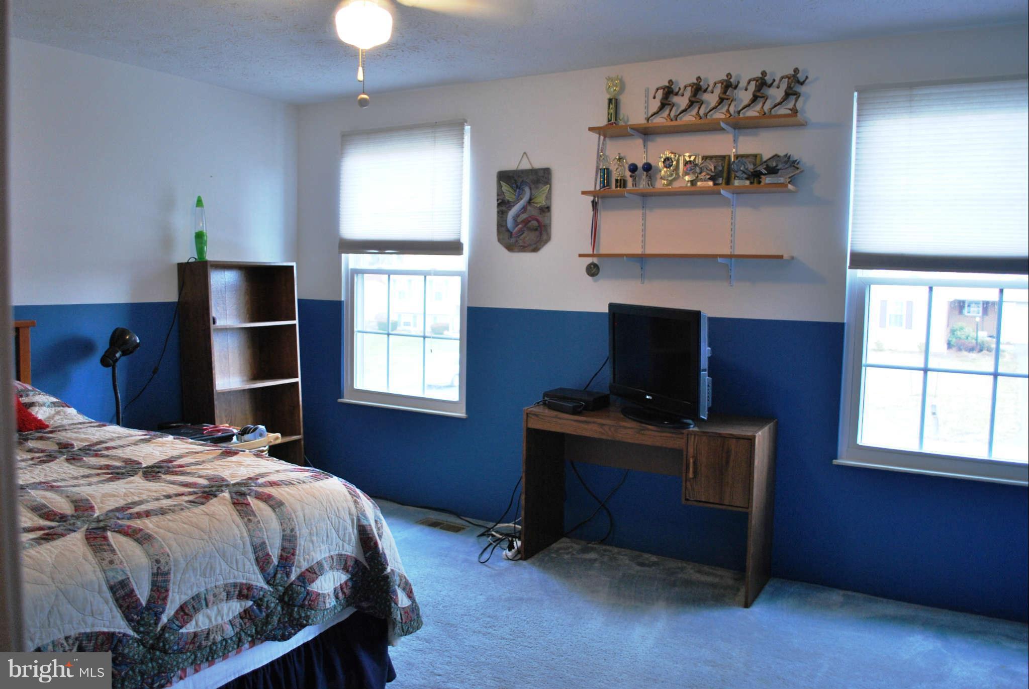 4309 Zircon Road Middletown, MD 21769 - Photo 14 of 22 a bedroom with a bed and a window