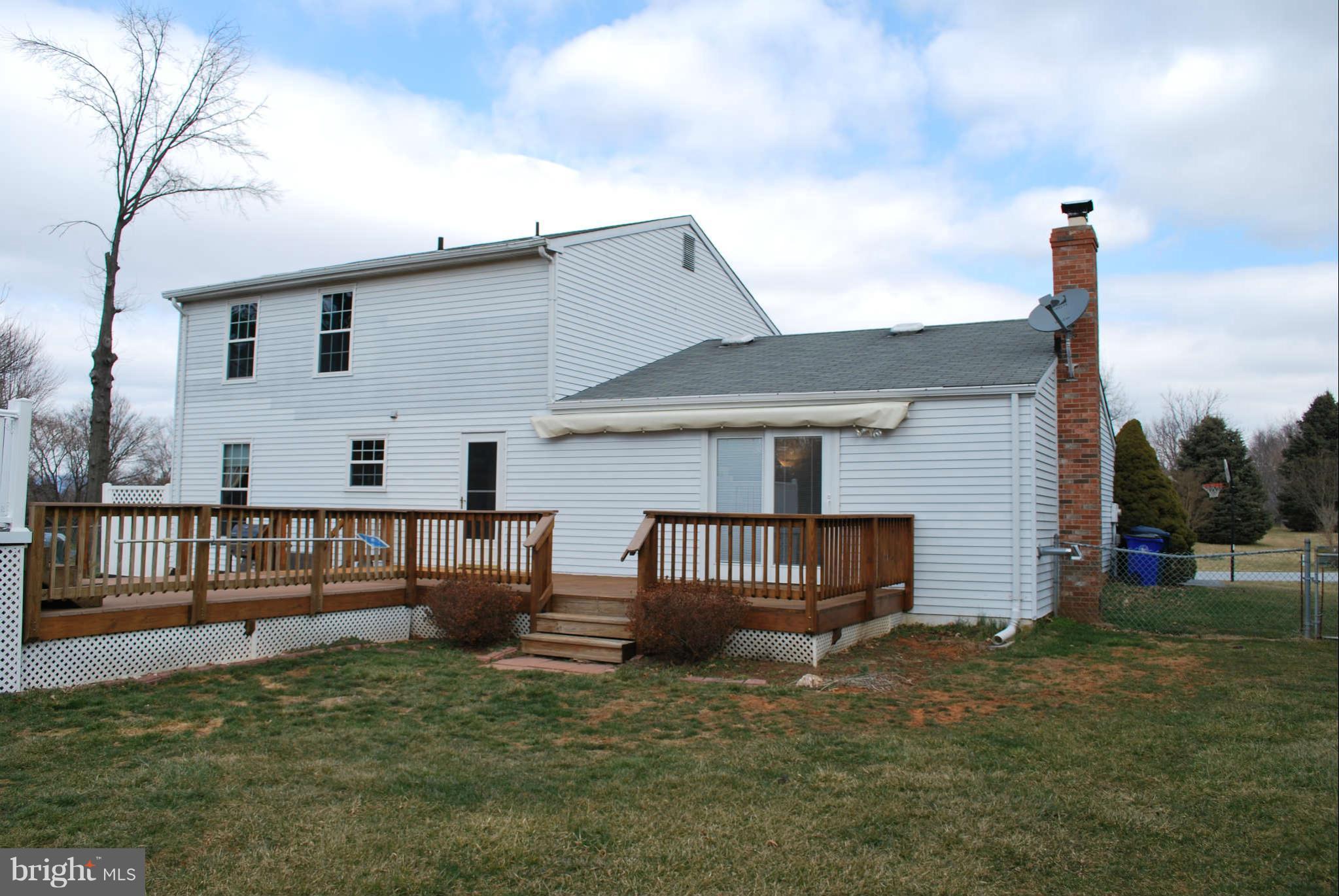 4309 Zircon Road Middletown, MD 21769 - Photo 3 of 22 a view of a house with backyard and a tree