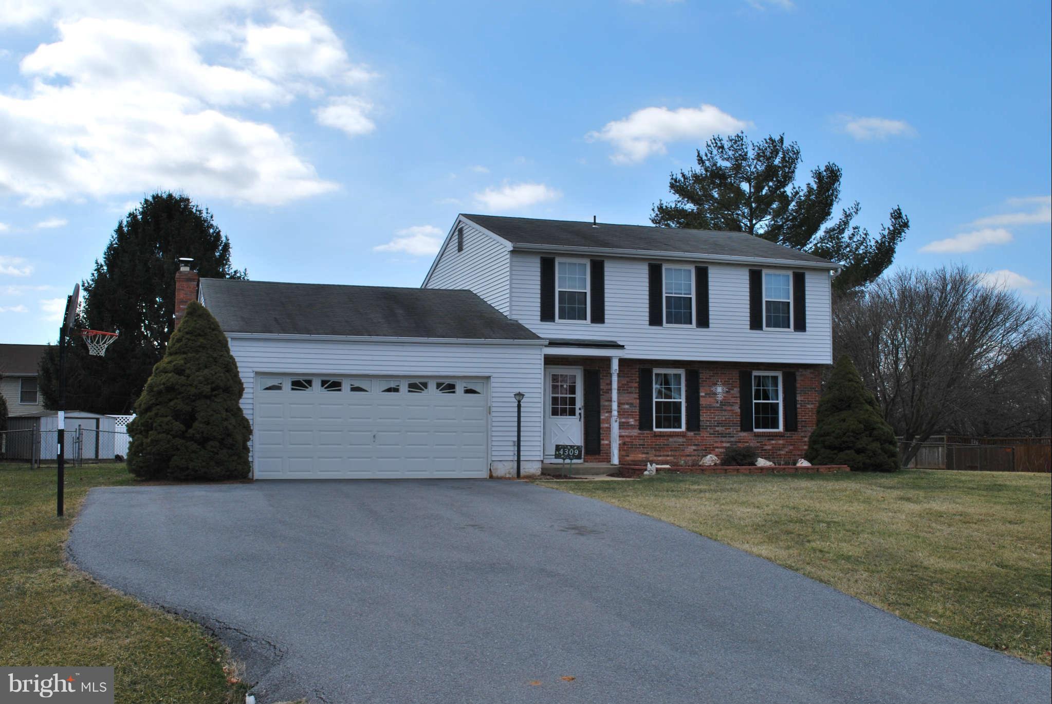 4309 Zircon Road Middletown, MD 21769 - Photo 22 of 22 a view of a house with a yard