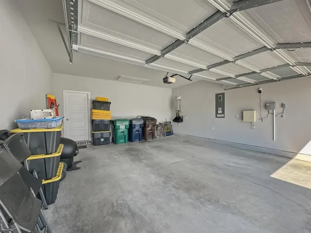 a balcony with table and chairs