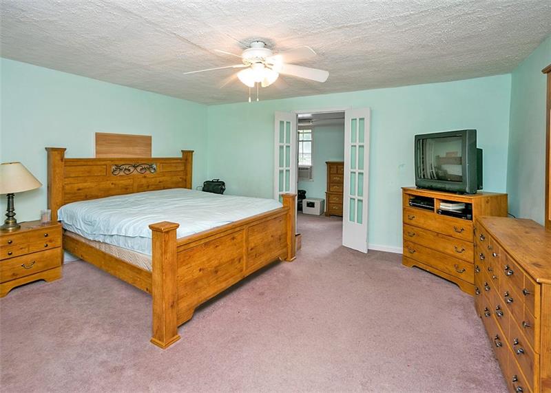 680 South Ridge Road Coal Center, PA 15423 - Photo 14 of 25 Master bedroom with dressing room/walk-in closet