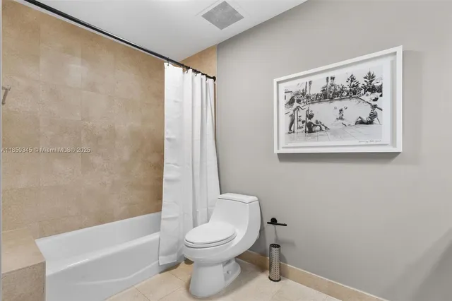 a view of balcony with two chairs and a table