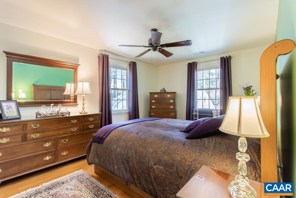 2412 Brook Road Charlottesville, VA 22901 - Photo 15 of 24 a bedroom with a bed and a dresser