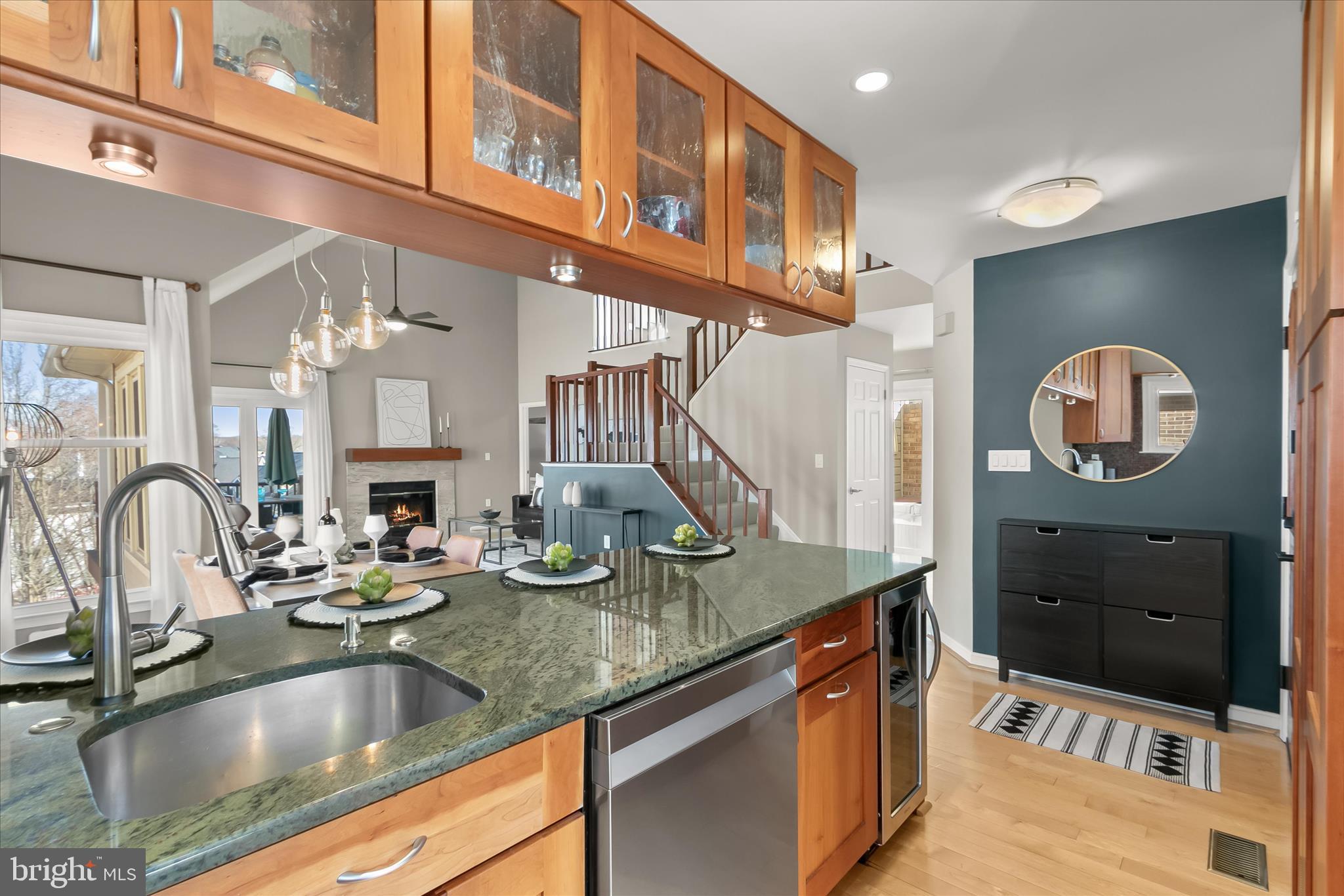 14215 Summit Lane Laurel, MD 20708 - Photo 13 of 62 a kitchen with stainless steel appliances granite countertop a sink and a wooden cabinets
