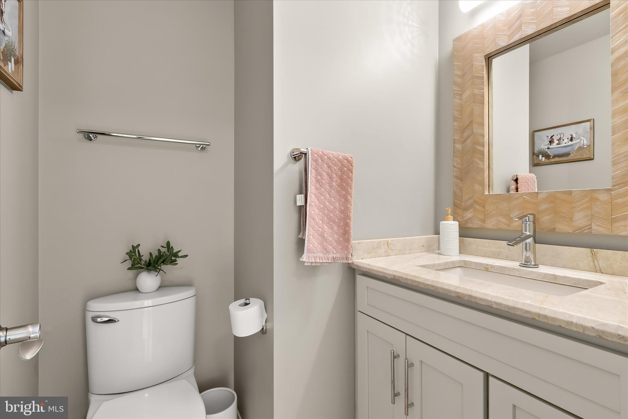 14215 Summit Lane Laurel, MD 20708 - Photo 14 of 62 a bathroom with a granite countertop sink a toilet and mirror