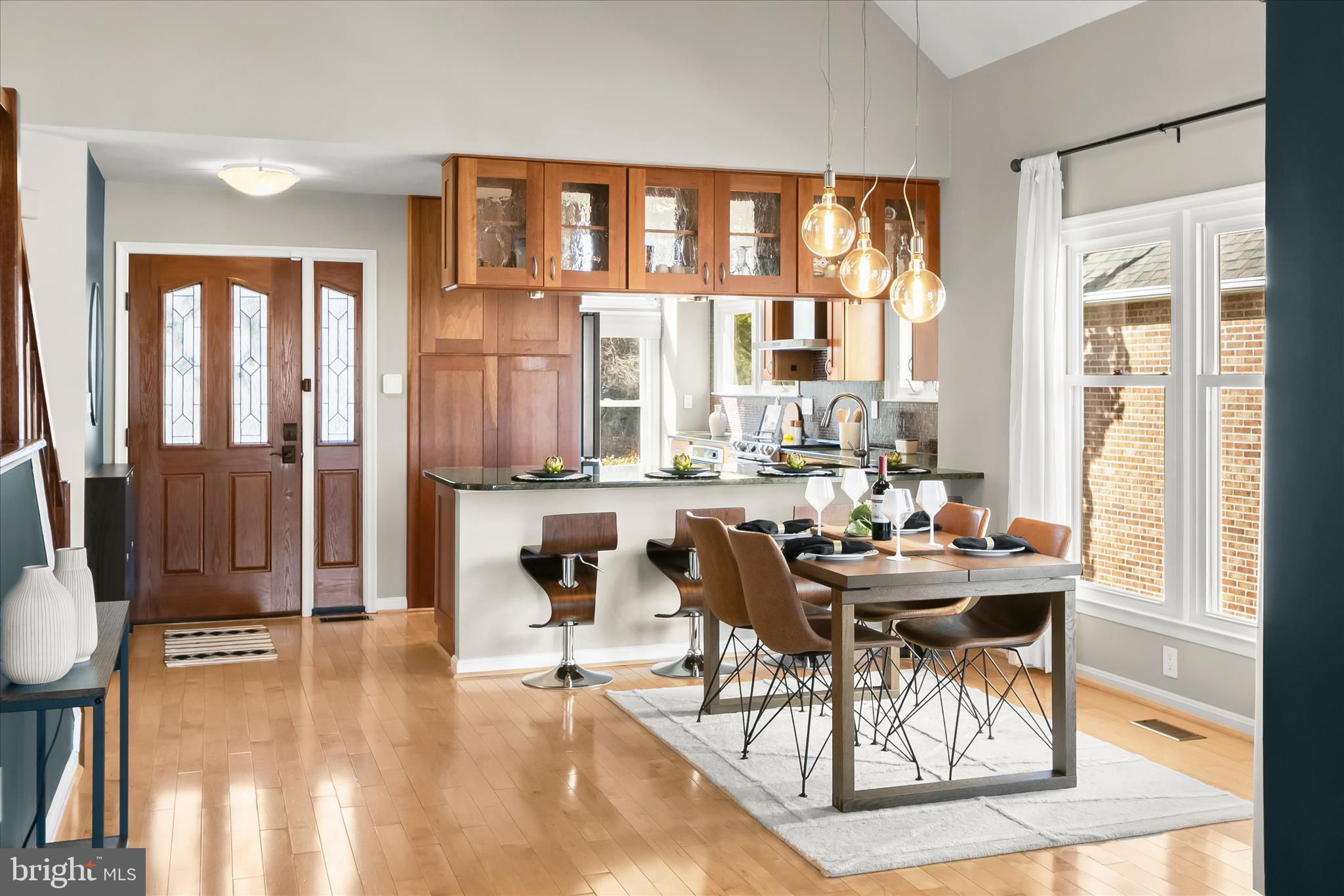 14215 Summit Lane Laurel, MD 20708 - Photo 18 of 62 a dining room with furniture and large windows