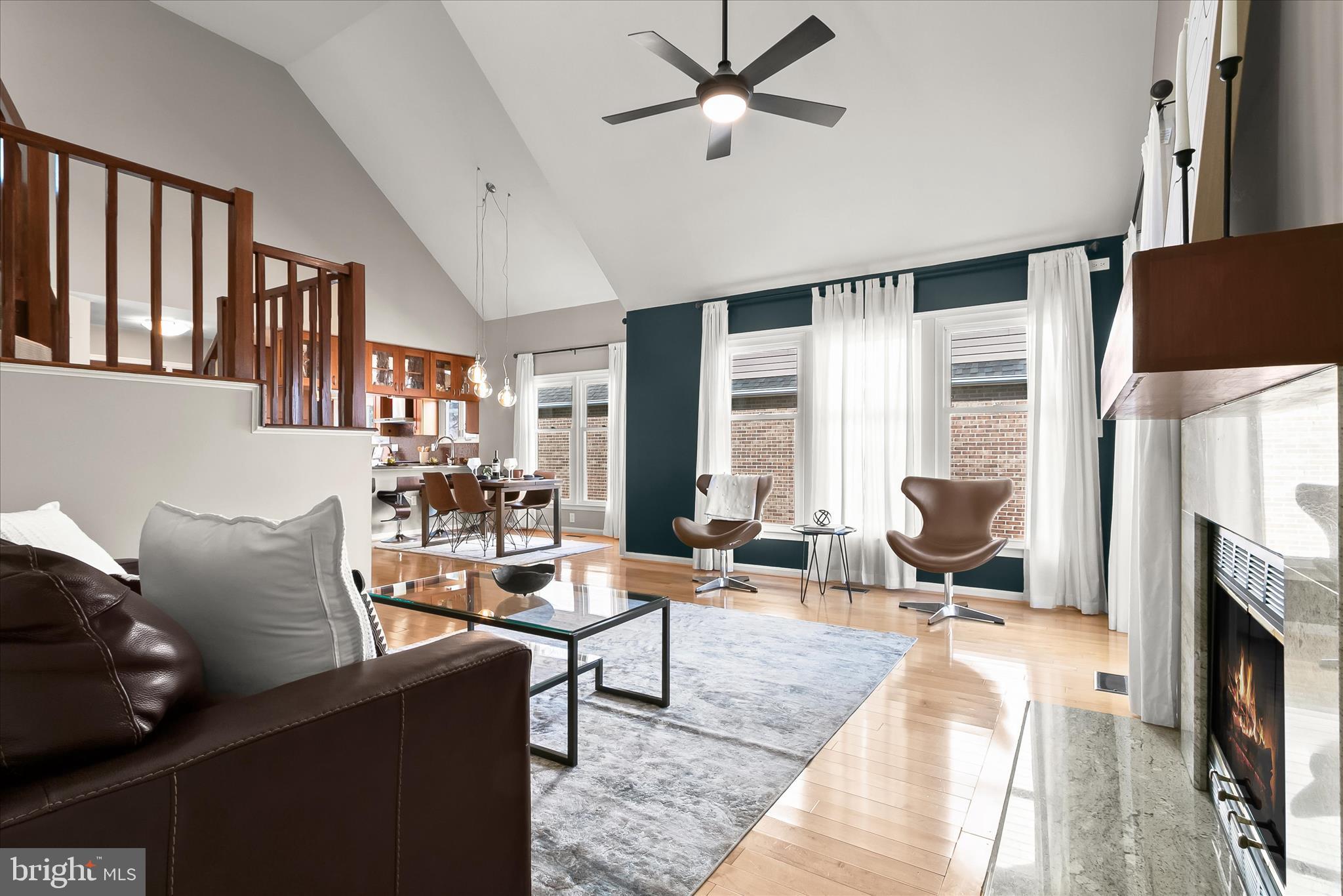 14215 Summit Lane Laurel, MD 20708 - Photo 21 of 62 a living room with furniture fireplace and a flat screen tv