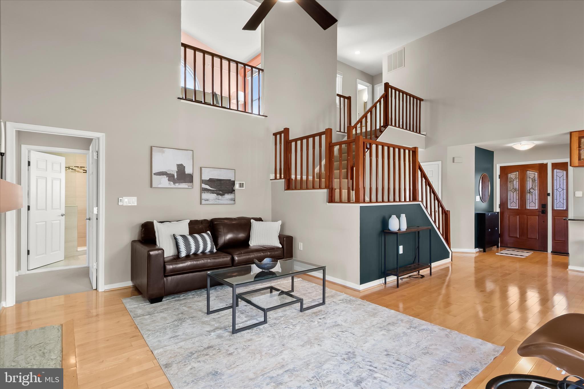 14215 Summit Lane Laurel, MD 20708 - Photo 22 of 62 a living room with furniture rug and a window
