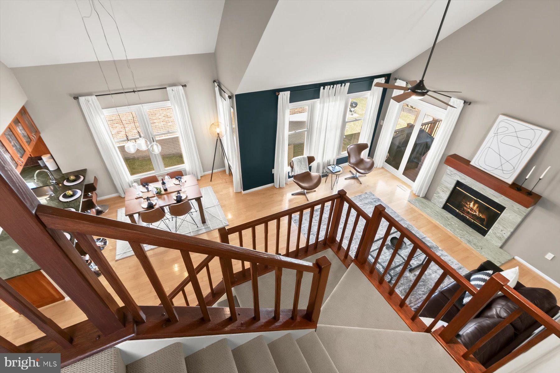 14215 Summit Lane Laurel, MD 20708 - Photo 31 of 62 a view of an chairs and dining room with wooden floor