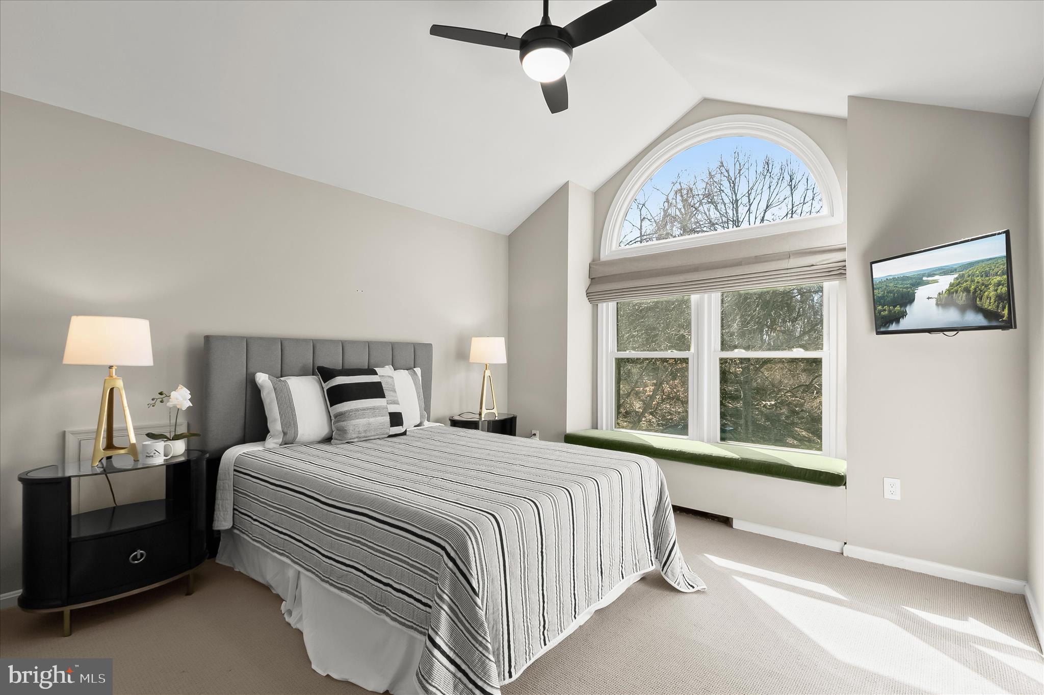 14215 Summit Lane Laurel, MD 20708 - Photo 32 of 62 a bedroom with a large bed and a window