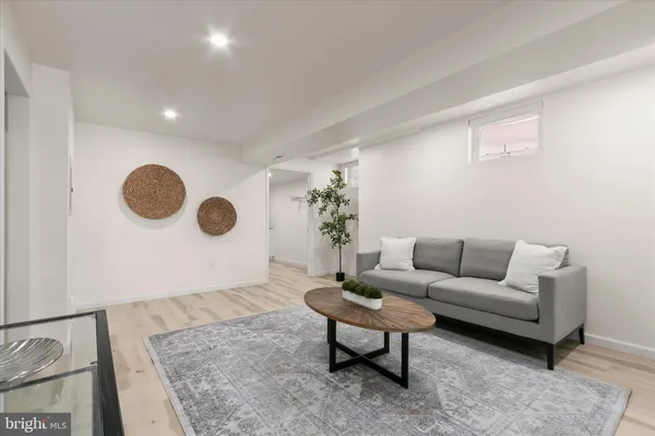 a bedroom with a bed and a mirror