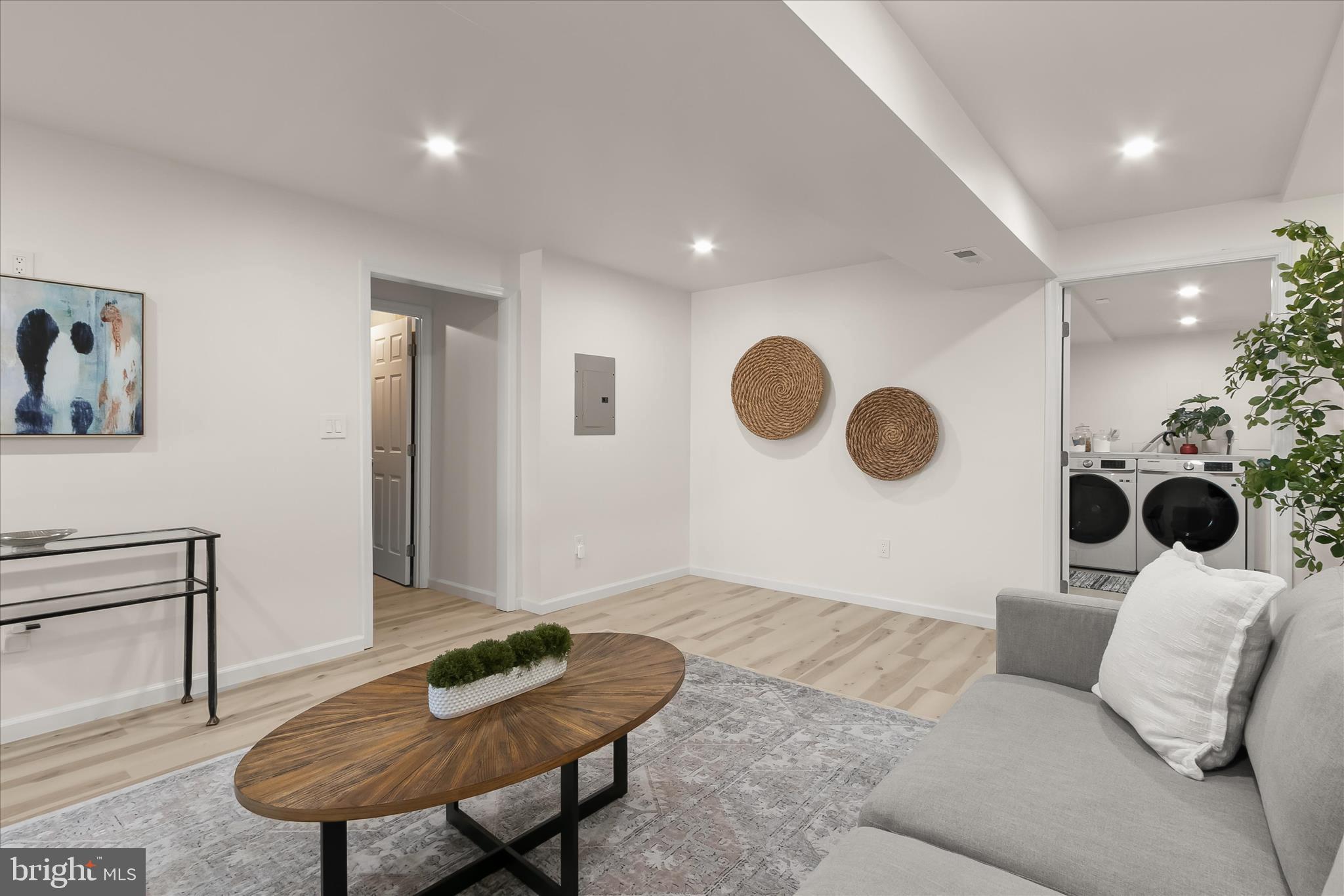 14215 Summit Lane Laurel, MD 20708 - Photo 42 of 62 a bedroom with a bed and a chair with garden view