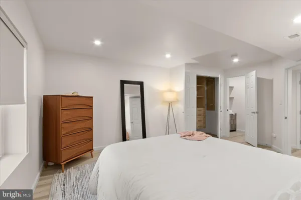 a picture of a room with a white wall and white walls