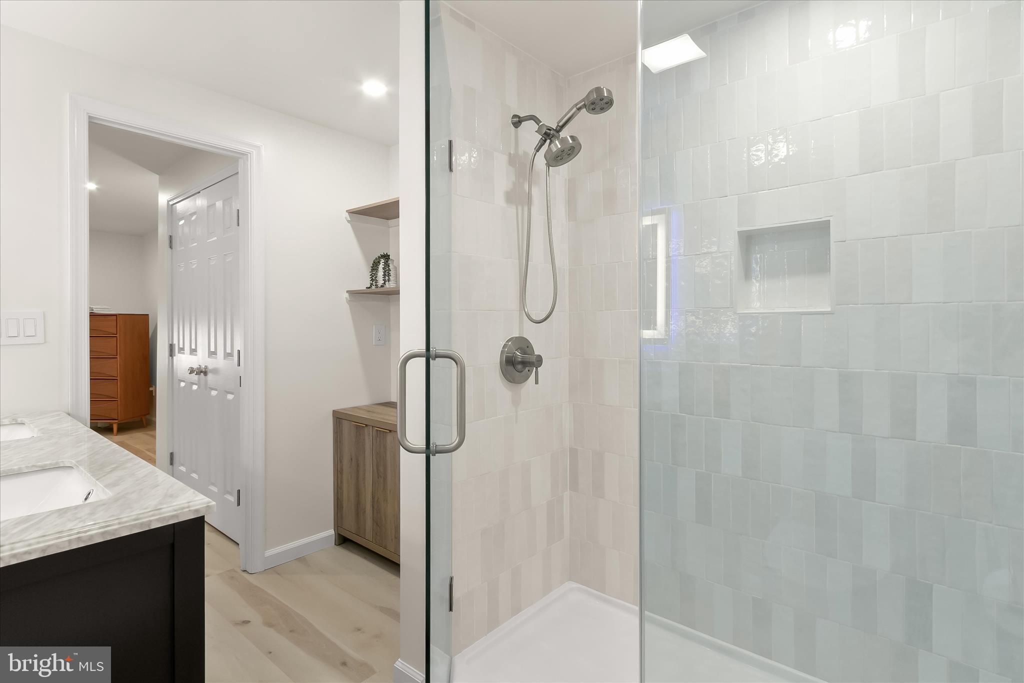 14215 Summit Lane Laurel, MD 20708 - Photo 52 of 62 a bathroom with a shower