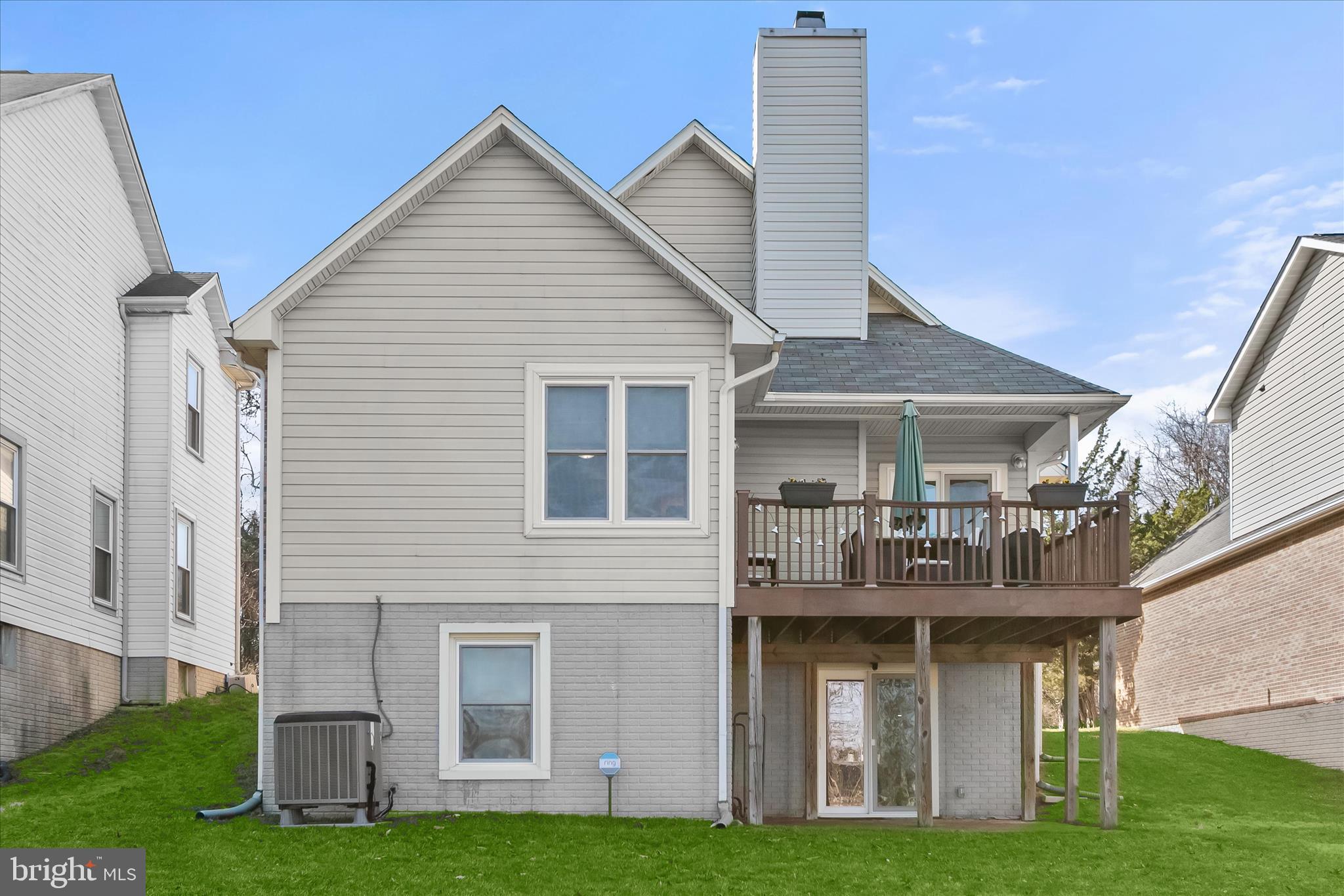 14215 Summit Lane Laurel, MD 20708 - Photo 54 of 62 a front view of white house with a yard