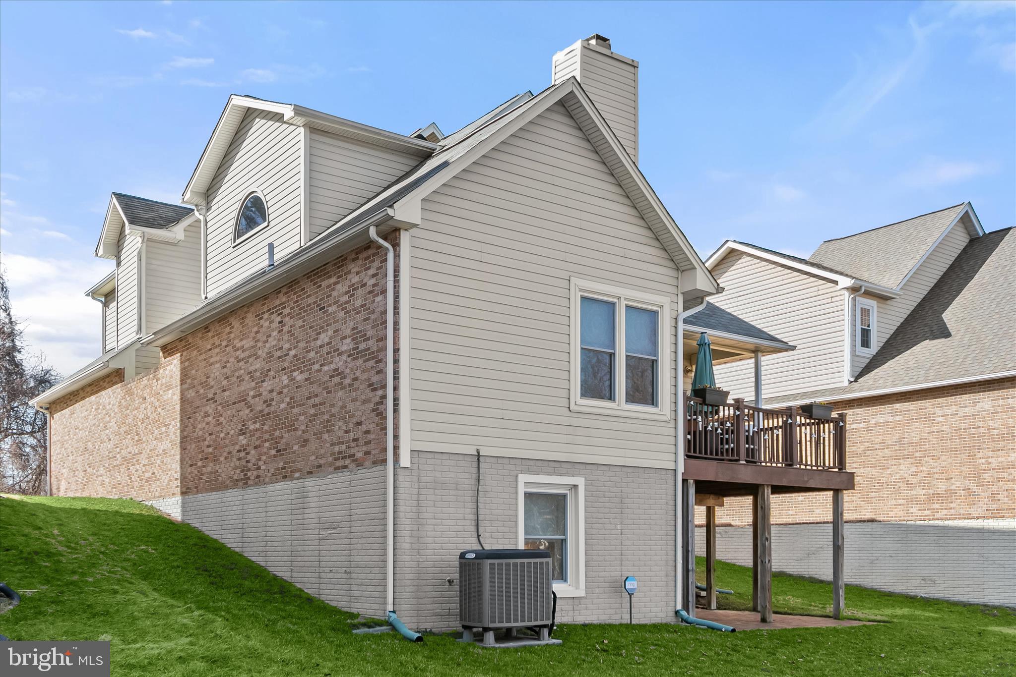 14215 Summit Lane Laurel, MD 20708 - Photo 55 of 62 a front view of a house with garden