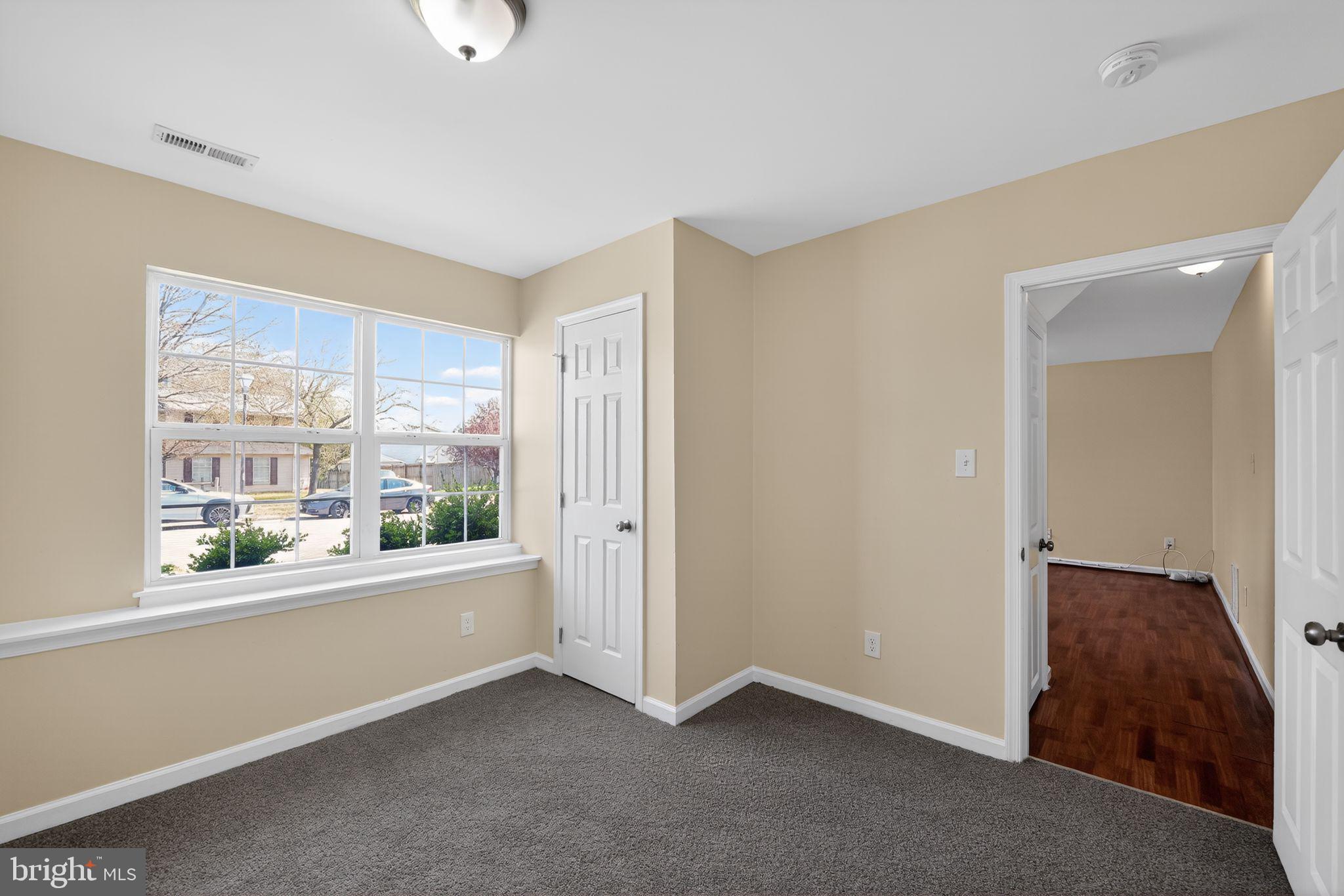 8090 Round Table Court Pasadena, MD 21122 - Photo 23 of 31 a view of an empty room with a window