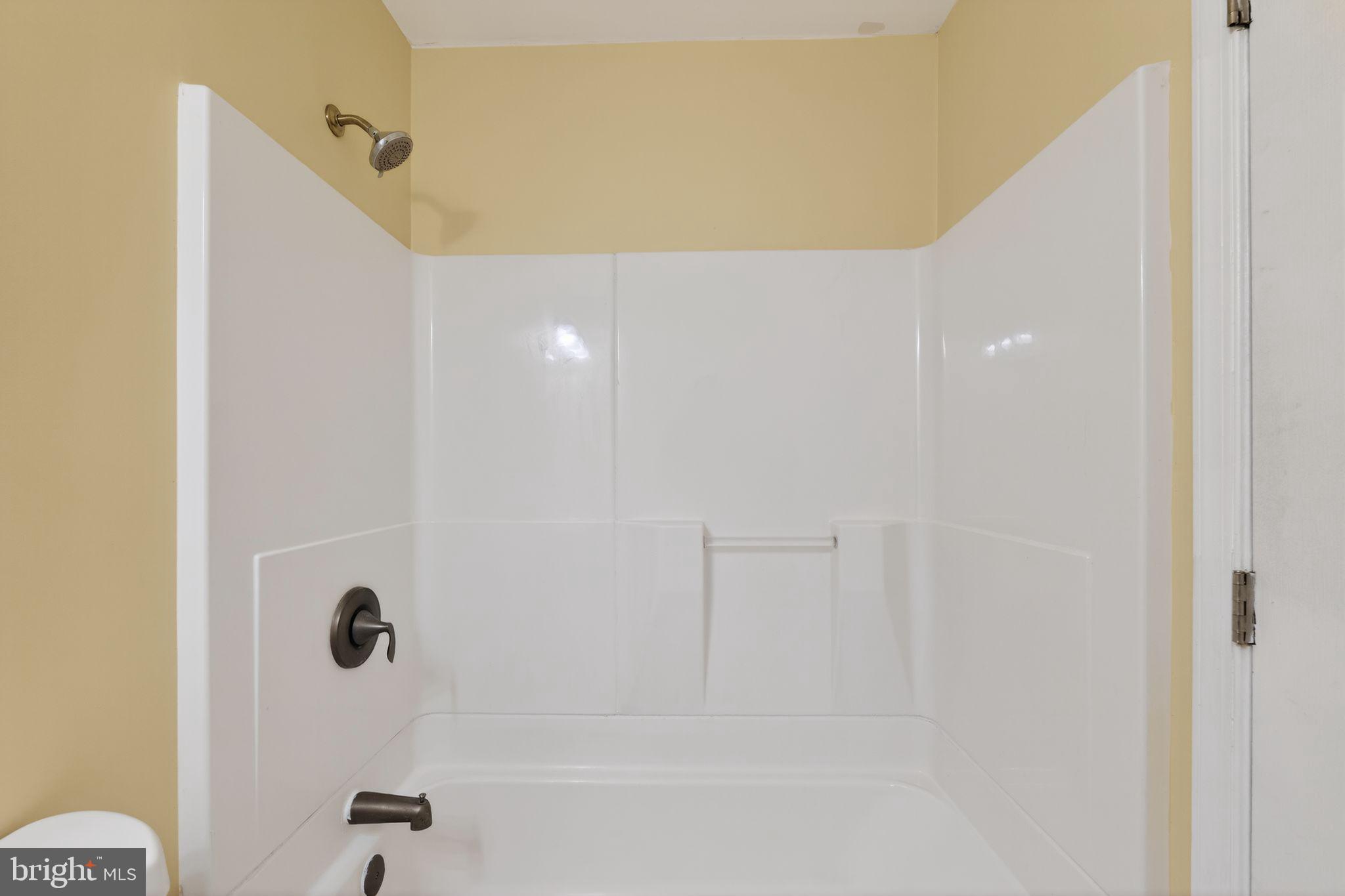 8090 Round Table Court Pasadena, MD 21122 - Photo 24 of 31 a bathroom with a shower