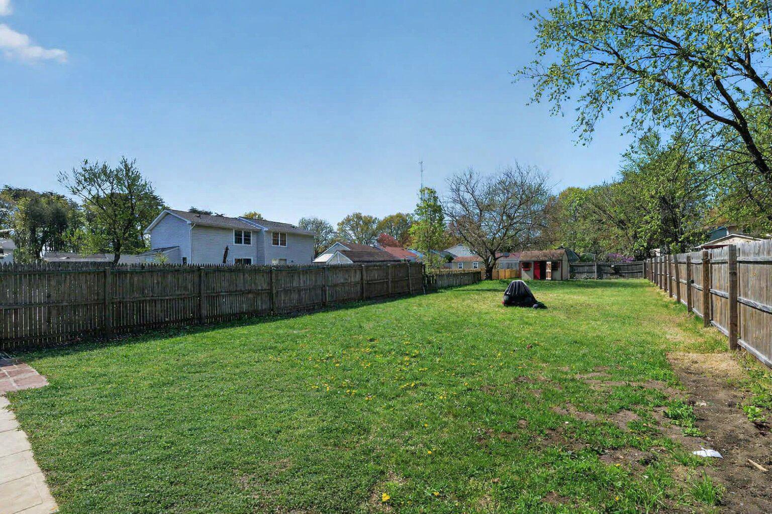 8090 Round Table Court Pasadena, MD 21122 - Photo 5 of 31 a view of garden with patio